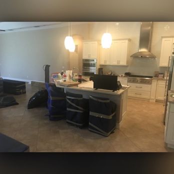 Go Express Movers - Covering my chairs with blankets - Movers Near Me Go Express Movers - Covering my chairs with blankets - Movers Near Me