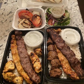 Kebab Skewer - Skewer Platters: Chicken Kebab, Chicken Koobideh, Beef Koobideh, Side salad, Steak Shish Kebab (upcharge), Onions & Tomatoes, Baked Pita - Kebab Near Me - Cary, North Carolina Kebab Skewer - Skewer Platters: Chicken Kebab, Chicken Koobideh, Beef Koobideh, Side salad, Steak Shish Kebab (upcharge), Onions & Tomatoes, Baked Pita - Kebab Near Me - Cary, North Carolina