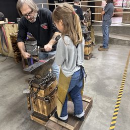 Heath guiding my daughter during her knife forging Heath guiding my daughter during her knife forging