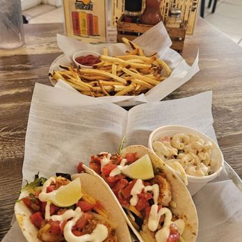 Crackers Island Grille - Blackened shrimp tacos, Hawaiian pasta, & side of fries. - American Near Me - Cape Canaveral, Florida Crackers Island Grille - Blackened shrimp tacos, Hawaiian pasta, & side of fries. - American Near Me - Cape Canaveral, Florida