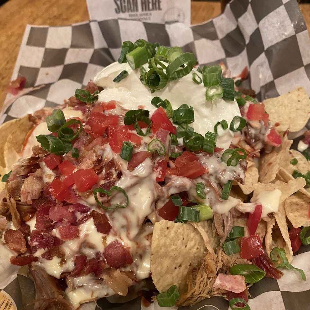 The Local - Pulled pork nachos, BBQ sauce is heavy on the sweet side. - Bars Near Me - Boone, North Carolina The Local - Pulled pork nachos, BBQ sauce is heavy on the sweet side. - Bars Near Me - Boone, North Carolina