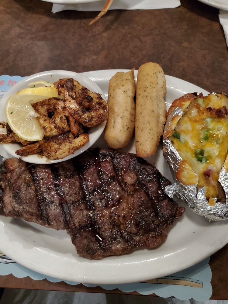 Order Ribeye (8 oz.) & Shrimp food online from Corky Bells Seafood & Steaks store, Fleming Island on bringmethat.com