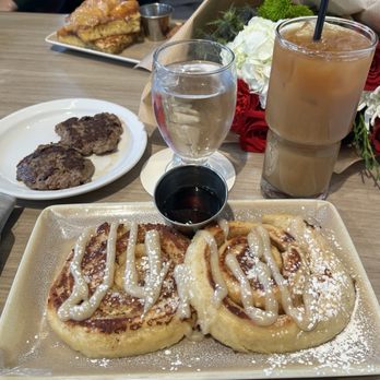 Dawn AM Eatery - Cinnamon Roll French Toast w/ turkey sausage and Iced Coffee and oat milk - Southern Near Me - Chicago, Illinois