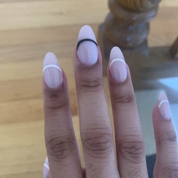 Nail Art Studio - Uneven lines and crooked middle finger that is much larger than other nails - Nail Salons Near Me - Northbrook, Illinois