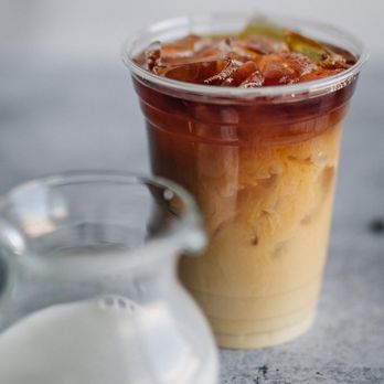 Ready Teddy's - a cup of iced coffee and a pitcher of milk - Coffee & Tea Near Me - Mt. Juliet, Tennessee