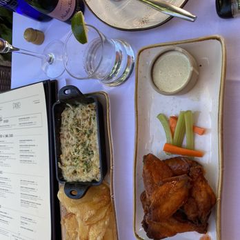 Paseo: A California Bistro - Caramelized Walla Walla Onion Dip And Crispy Buffalo Wings  Get the onion dip; it's fantastic and so rich in flavor - New American Near Me - Mill Valley, California