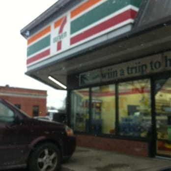 7-Eleven - a car parked in front of a convenience store - Convenience Stores Near Me - Toronto, Ontario