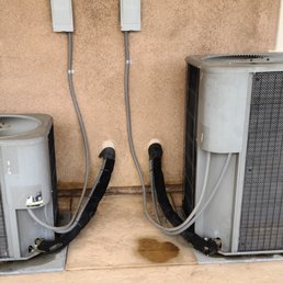 Picture is after service (just water beside the tall air conditioner).