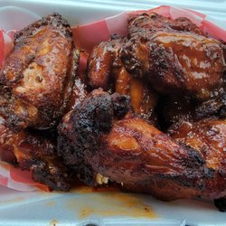 James BBQ - Smoked wings with hot sauce.