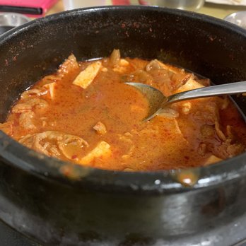 Korean Mart - Kim Cher chiggae (stew) piping HOT and delivered to the table in smoking hot pot! Forgot to take pics when it got here, my bad - Korean Near Me - Fresno, California