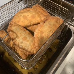 Wanda’s Puerto Rican Cuisine - Cooked empanadillas de Carne ( Beef Empanadas)