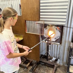 Sonoran Glass School - Turning the glass in the furnace