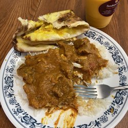 Tandoori Oven - Lamb Rogan Josh, Garlic Naan, and Mango Lassi