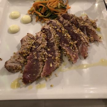 L'Osteria di Brera - Seared tuna steak with a pistachio crust and mild wasabi mayo sauce on the side - Italian Near Me - Milan, Michigan L'Osteria di Brera - Seared tuna steak with a pistachio crust and mild wasabi mayo sauce on the side - Italian Near Me - Milan, Michigan