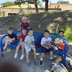 Tk children waiting for the van to pick them up.