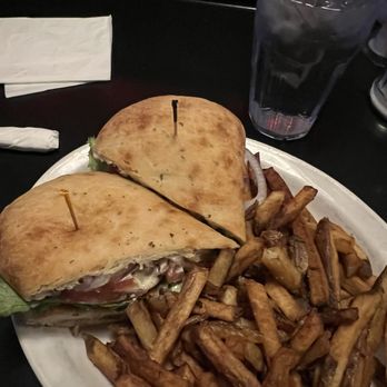 The 5 Point Café - Chrispy chicken sandwich with French fries - Dive Bars Near Me - Seattle, Washington The 5 Point Café - Chrispy chicken sandwich with French fries - Dive Bars Near Me - Seattle, Washington