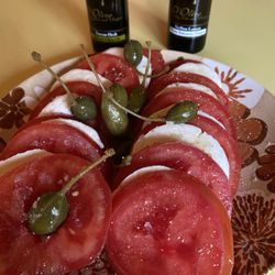 Caper Berries with tomato and mozzarella.