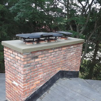 Northrup Masonry & Construction - Chimney repair with concrete cap - Chimney Sweeps Near Me - Brighton , Michigan Northrup Masonry & Construction - Chimney repair with concrete cap - Chimney Sweeps Near Me - Brighton , Michigan