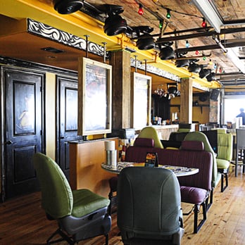 Squeeze - the inside of a restaurant with wooden floors - Bars Near Me - Galveston, Texas Squeeze - the inside of a restaurant with wooden floors - Bars Near Me - Galveston, Texas