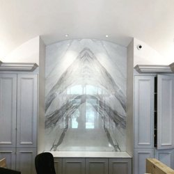 Picasso tile & Stone - This project was completed using two large format porcelain tiles that simulate the look of granite slabs