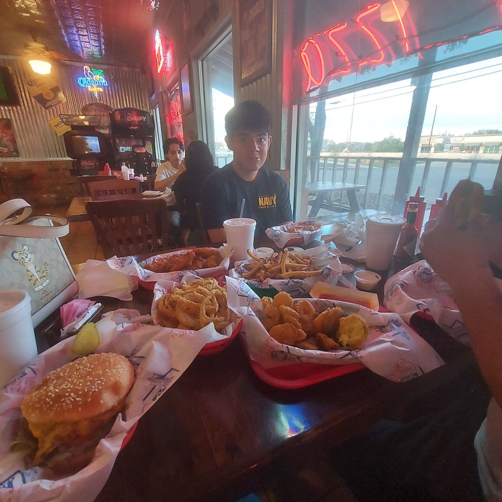 Babe's Old Fashioned Food - My kid not wanting to take a pic smh. Got some onion wings, fries, fried pickels and wings. - Burgers Near Me - Helotes, Texas Babe's Old Fashioned Food - My kid not wanting to take a pic smh. Got some onion wings, fries, fried pickels and wings. - Burgers Near Me - Helotes, Texas
