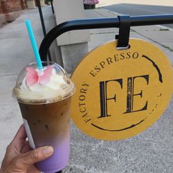 Factory Espresso at Hart - My pretty drink with their sign on the sidewalk