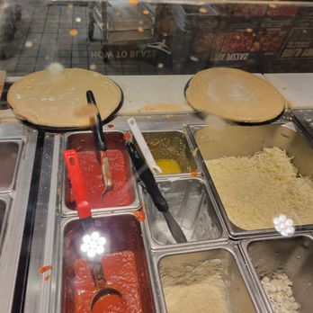 Blaze Pizza - No white sauce, sauce splatter on the glass - Salad Near Me - Avondale, Arizona