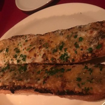 Dear John’s - Cheesy garlic bread.  You have to order this separately and it's wonderful. - American Near Me - Culver City, California