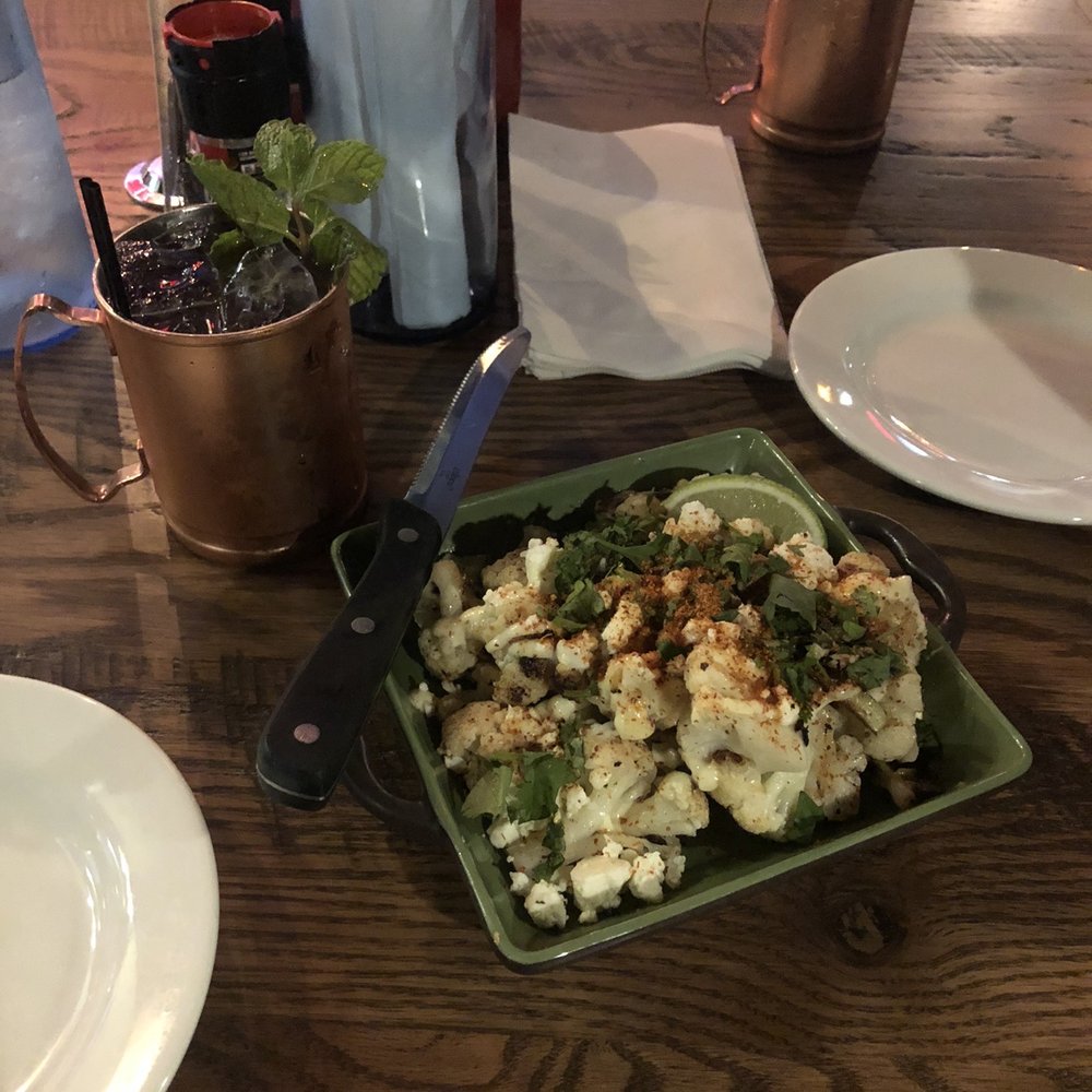 Squid Ink Eclectic Eats & Drinks - Mistletoe Mule with Street Cauliflower - Gastropubs Near Me - Mobile, Alabama