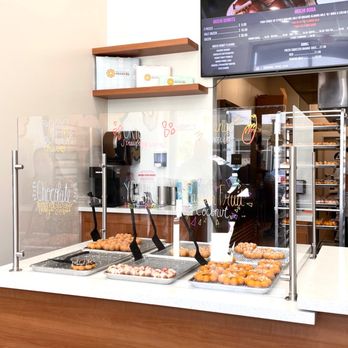 Mochinut - a display of donuts and pastries - Hot Dogs Near Me - Fresno, California