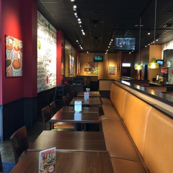 Uncle Maddio's - Seating arrangement as you walk-in. I prefer the high seats to the right of this photo. - Pizza Near Me - High Point, North Carolina Uncle Maddio's - Seating arrangement as you walk-in. I prefer the high seats to the right of this photo. - Pizza Near Me - High Point, North Carolina