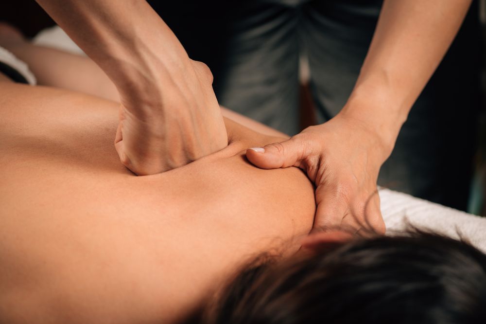 MacKnew Massage & Bodywork Logo