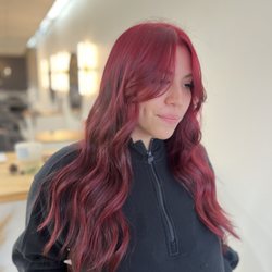 Lavish Beauty Parlour - Beautiful red color with face framing layers done by Heidy
