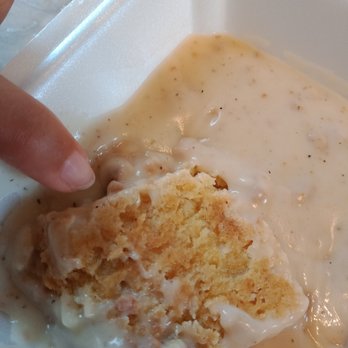 Flo's Diner - a person's hand reaching for a piece of food - Diners Near Me - Canastota, New York