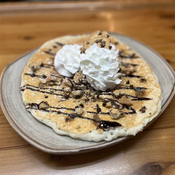 The Edison Grill - a plate of pancakes with whipped cream and chocolate sauce - Bars Near Me - Harwinton, Connecticut The Edison Grill - a plate of pancakes with whipped cream and chocolate sauce - Bars Near Me - Harwinton, Connecticut