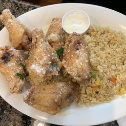 Garlic Parmesan Chicken Wings and double side of fried rice Garlic Parmesan Chicken Wings and double side of fried rice