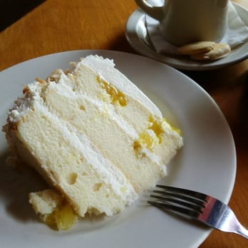 Empire Cafe - Pineapple coconut cake & a cup of Ethiopian coffee. - Breakfast & Brunch Near Me - Houston, Texas Empire Cafe - Pineapple coconut cake & a cup of Ethiopian coffee. - Breakfast & Brunch Near Me - Houston, Texas