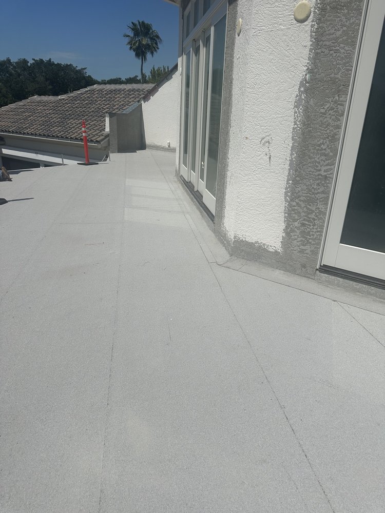 Slide of Saint Pauls Roofing