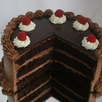 Savory - Killer chocolate cake with French silk buttercream frosting, ganache, real whipped cream and raspberries - Caterers Near Me Savory - Killer chocolate cake with French silk buttercream frosting, ganache, real whipped cream and raspberries - Caterers Near Me
