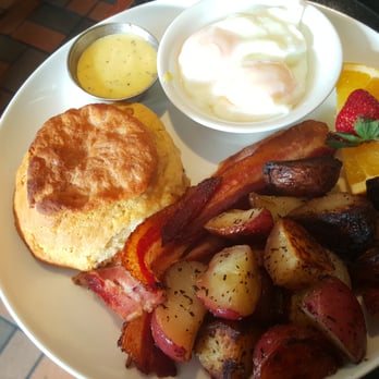 Emma's Country Kitchen - The Classic ($1 hollandaise,  $1.50 buttermilk biscuit). Difference between the classic and the Emma's Benny is the bacon. - Breakfast & Brunch Near Me - Toronto, Ontario