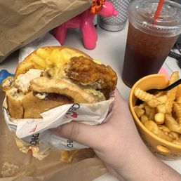 Macaroni and cheese sandwich with fries and a drink. Macaroni and cheese sandwich with fries and a drink.