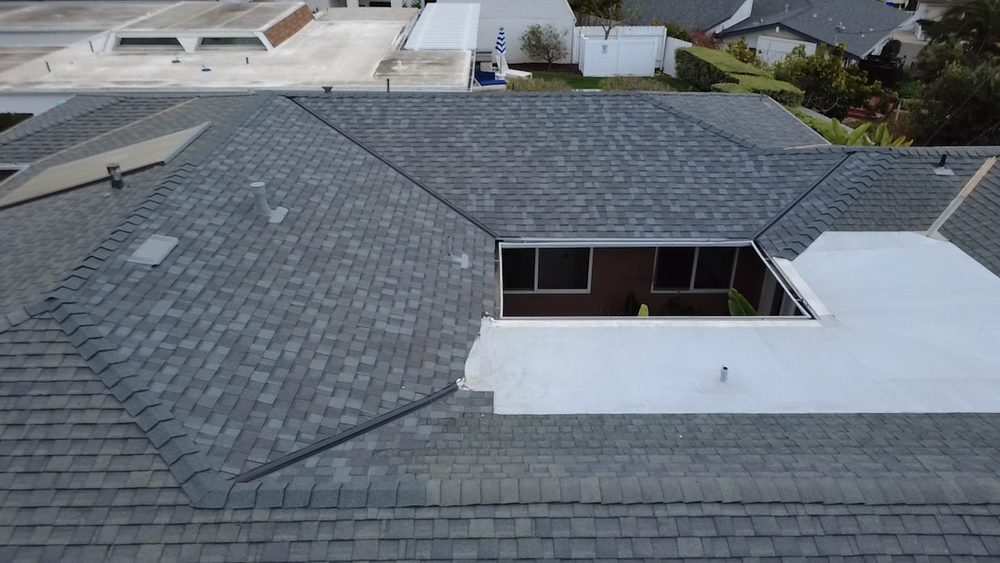 Slide of Vigil's Roofing