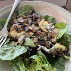 HIVE Cafe - My burger with mushrooms and blue cheese over greens.