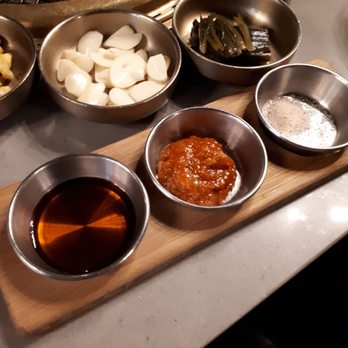 Kook Korean BBQ - 2 dipping sauces and a mixture of salt n pepper for bbq meats. - Korean Near Me - Vancouver, British Columbia Kook Korean BBQ - 2 dipping sauces and a mixture of salt n pepper for bbq meats. - Korean Near Me - Vancouver, British Columbia