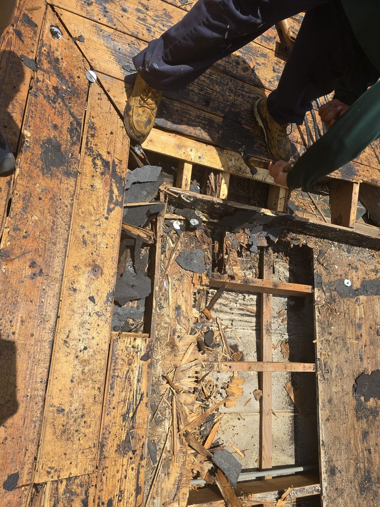 Slide of Advanced Roofing & Construction