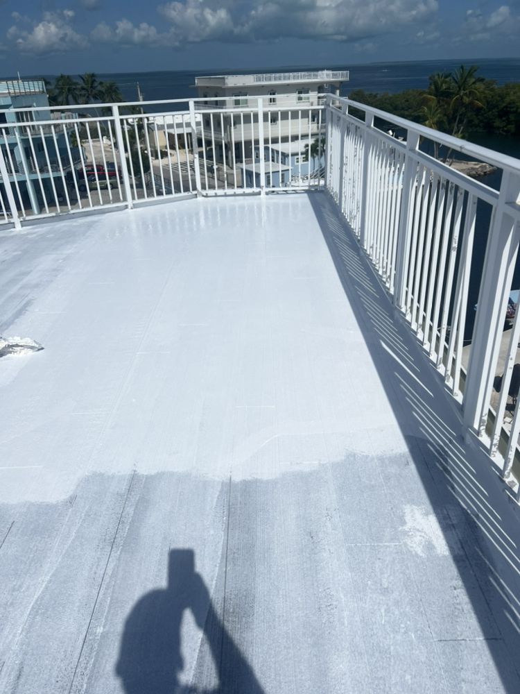 Slide of Andy The Roofer & Co