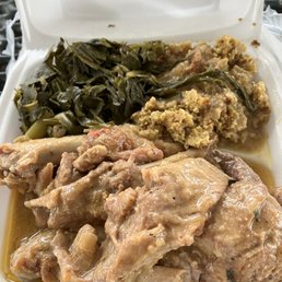 Smothered turkey wings, dressing and greens. Smothered turkey wings, dressing and greens.