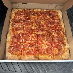 Taste of Naples Pizzeria - Thin crust, well done. Pepperoni, bacon, sundried tomatoes and roasted peppers