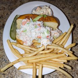 Charlie’s Place - Crab sandwich with pickle, Cole slaw, and a side of fries