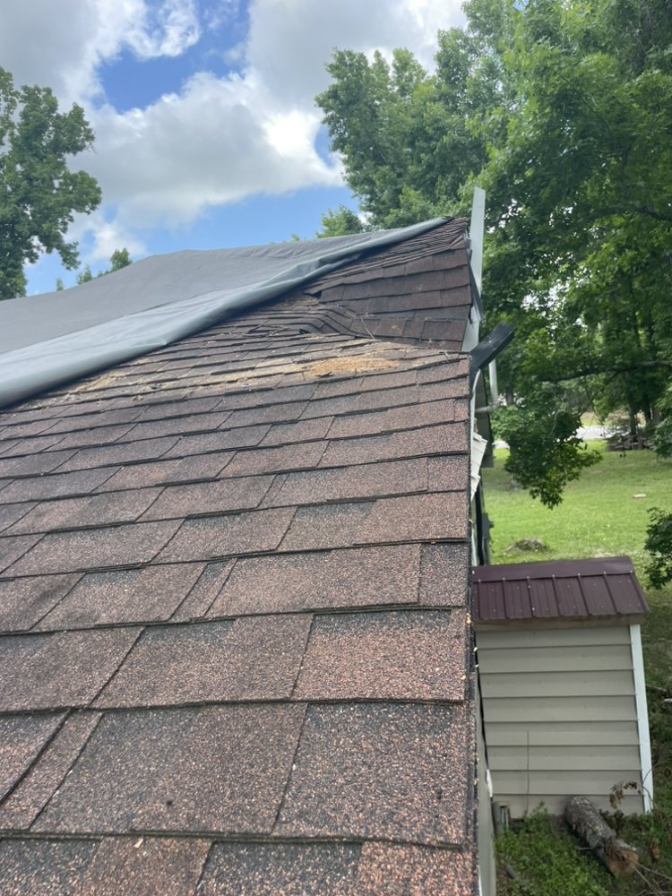 Slide of Leger’s Roofing & Con